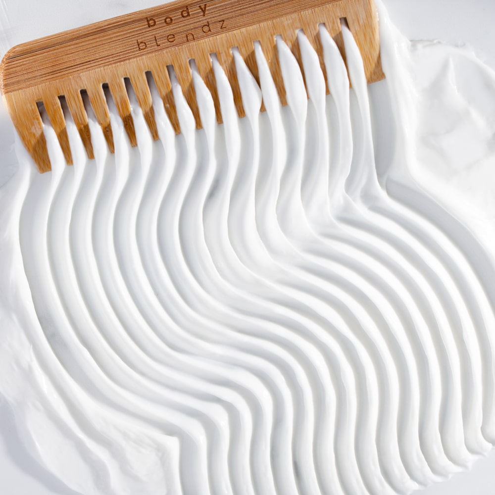 BodyBlendz bamboo wide tooth comb with conditioner, ideal for detangling wet hair, evenly distributing product, and reducing breakage for smoother, healthier hair