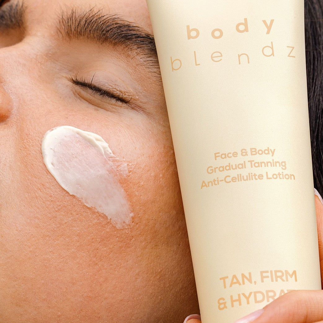 BodyBlendz gradual tanning anti-cellulite lotion applied on face, lightweight hydrating self tan for natural glow and smooth skin