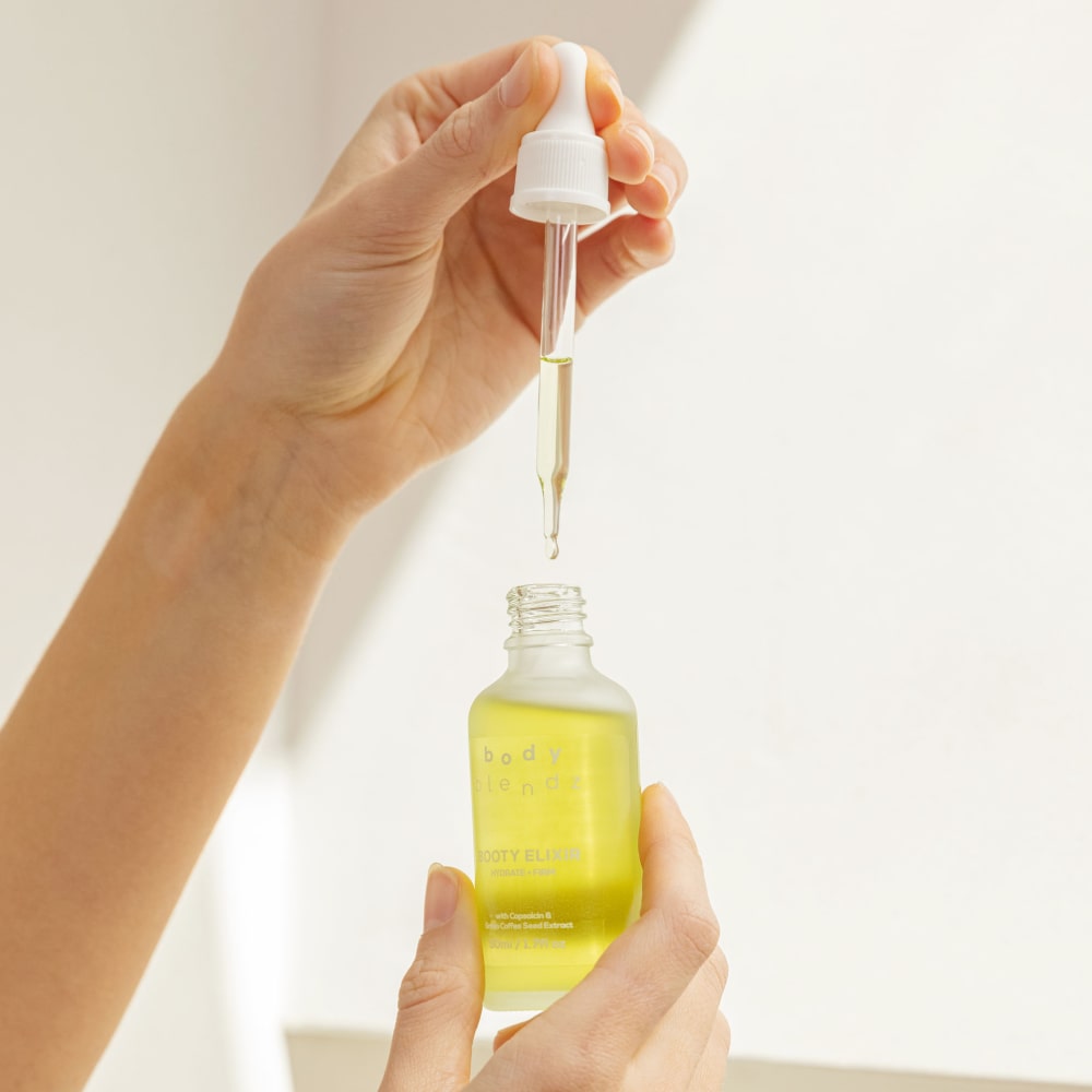 BodyBlendz booty elixir dropper bottle, hydrating and firming body oil with lightweight fast absorbing formula